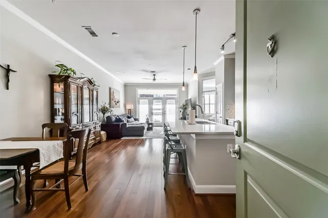 a view of a living room and dining room