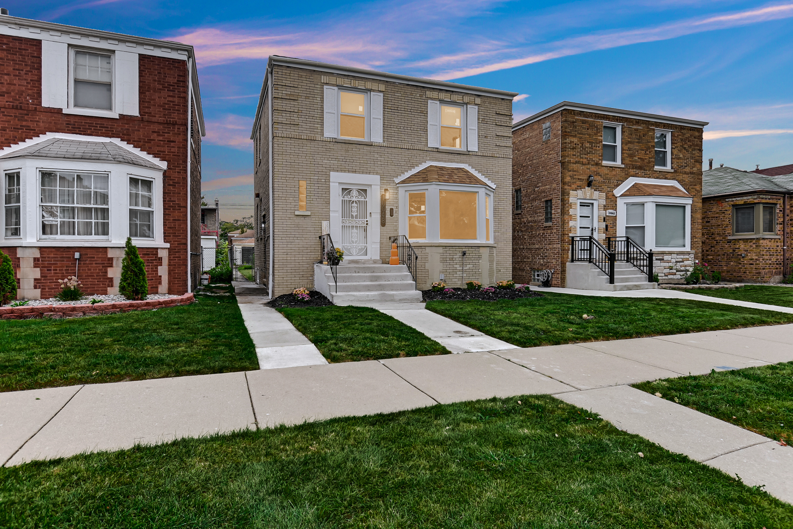 10048 South Rhodes Avenue Chicago, IL 60628 - Photo 1 of 32 Gallery Image 1