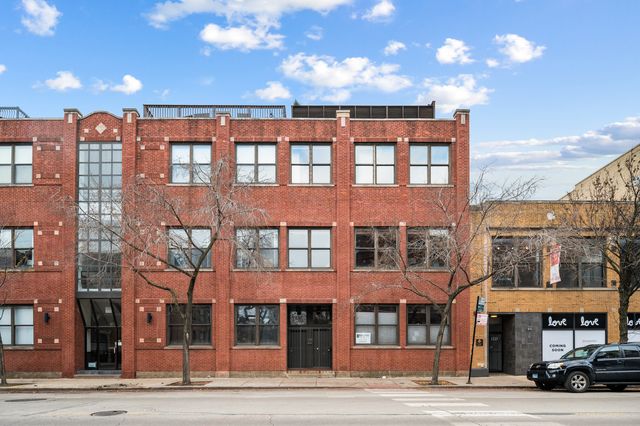 a front view of a building and a street