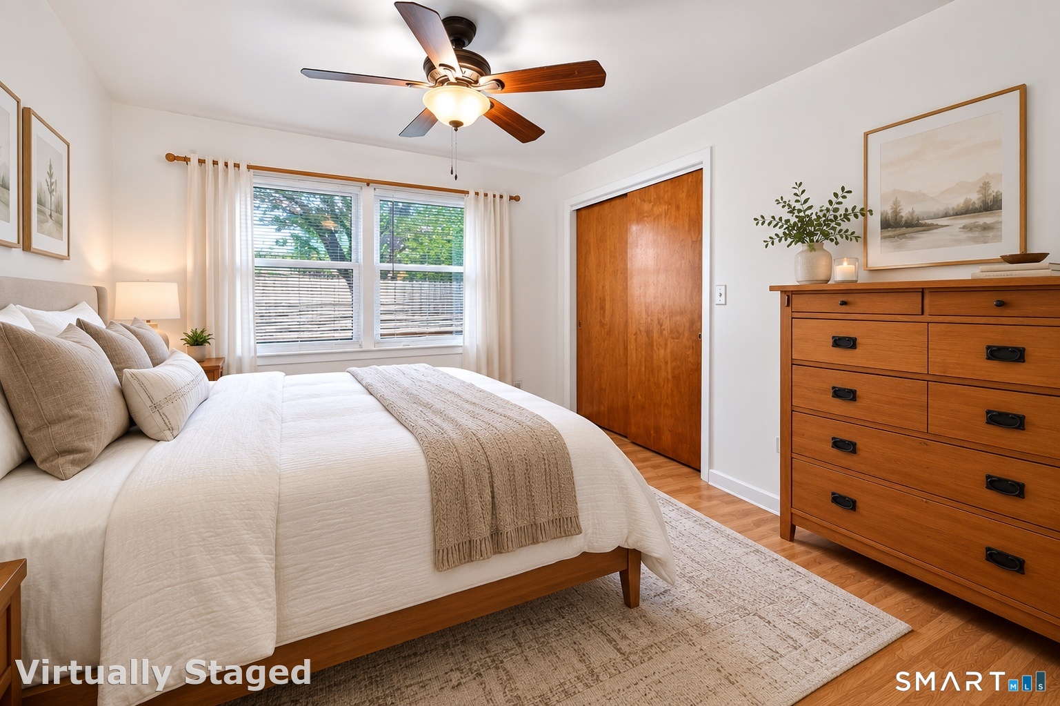 30 Grafton Road Hamden, CT 06517 - Photo 15 of 23 a bedroom with a bed a dresser and a window