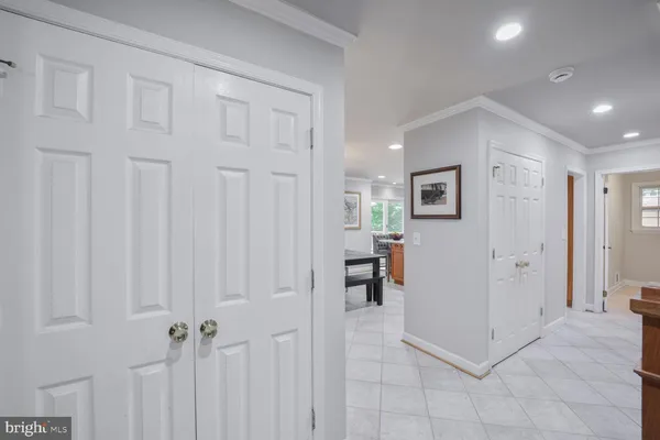 a view of a hallway with closet area