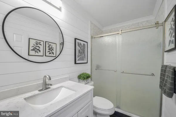 a kitchen with a cabinets and stove top oven