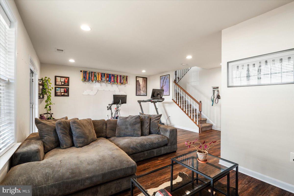 6500 Newton Drive Frederick, MD 21703 - Photo 27 of 36 a living room with furniture and stairs