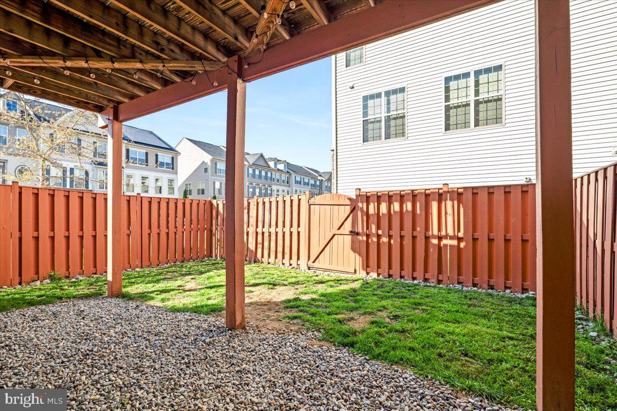 6500 Newton Drive Frederick, MD 21703 - Photo 33 of 36 a view of a backyard with garden