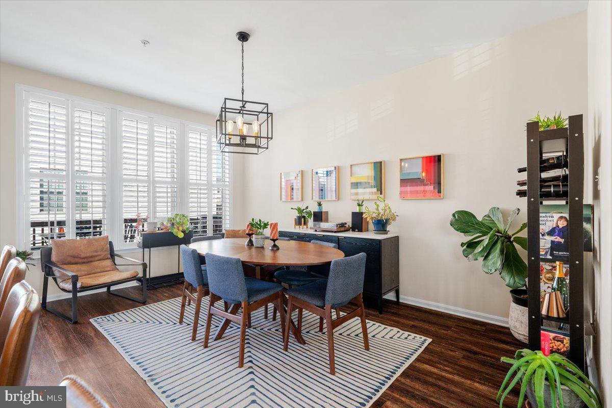 6500 Newton Drive Frederick, MD 21703 - Photo 8 of 36 a view of a livingroom with furniture window and wooden floor