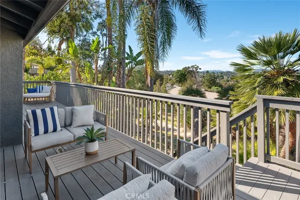 a view of a two chairs in the deck