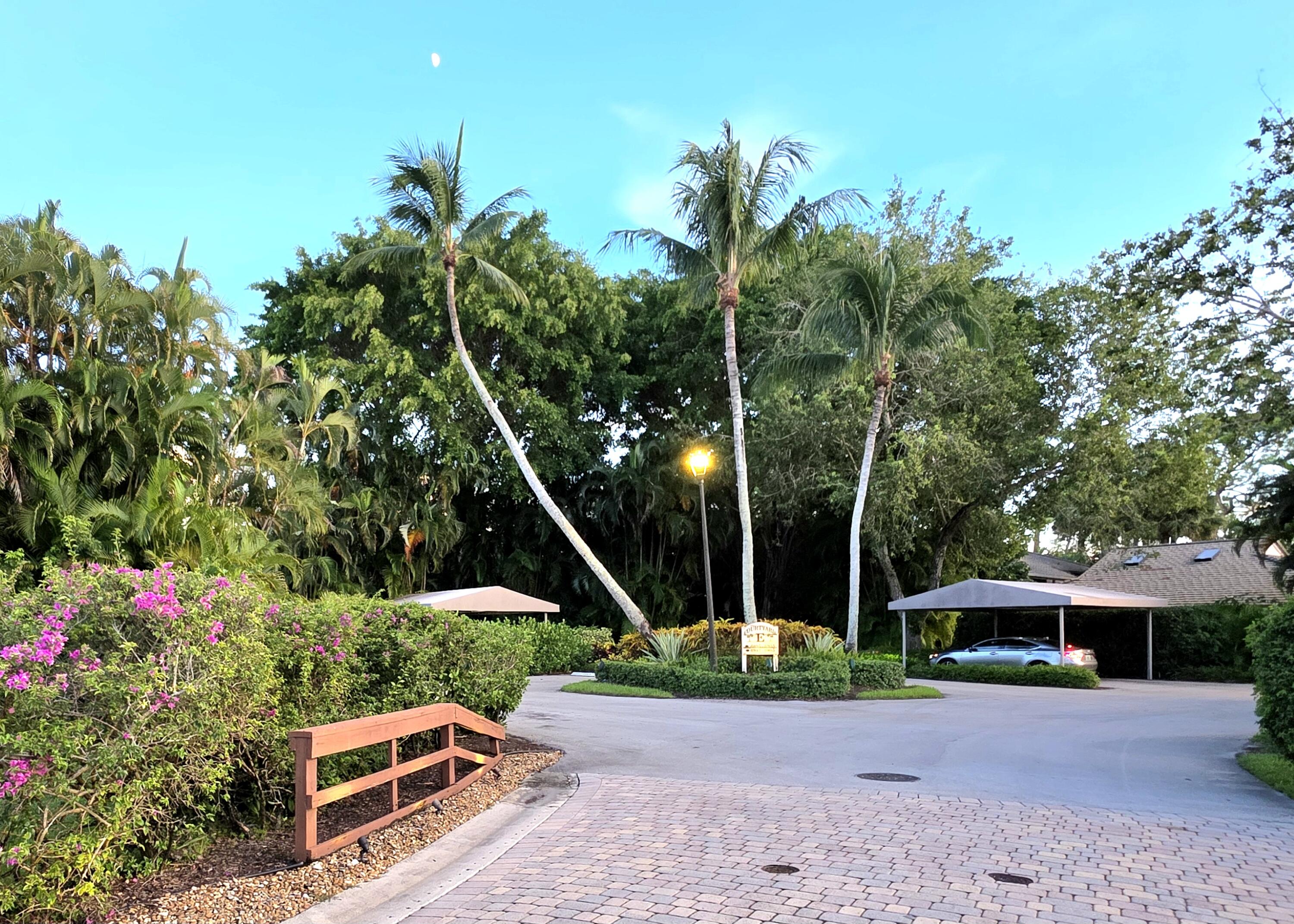 6957 Rain Forest Drive Boca Raton, FL 33434 - Photo 5 of 11 a garden view with a seating space