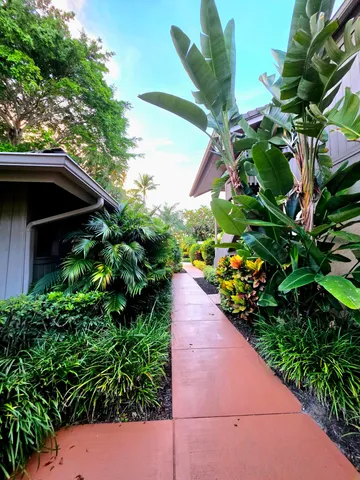 a view of a lake with a house in the background