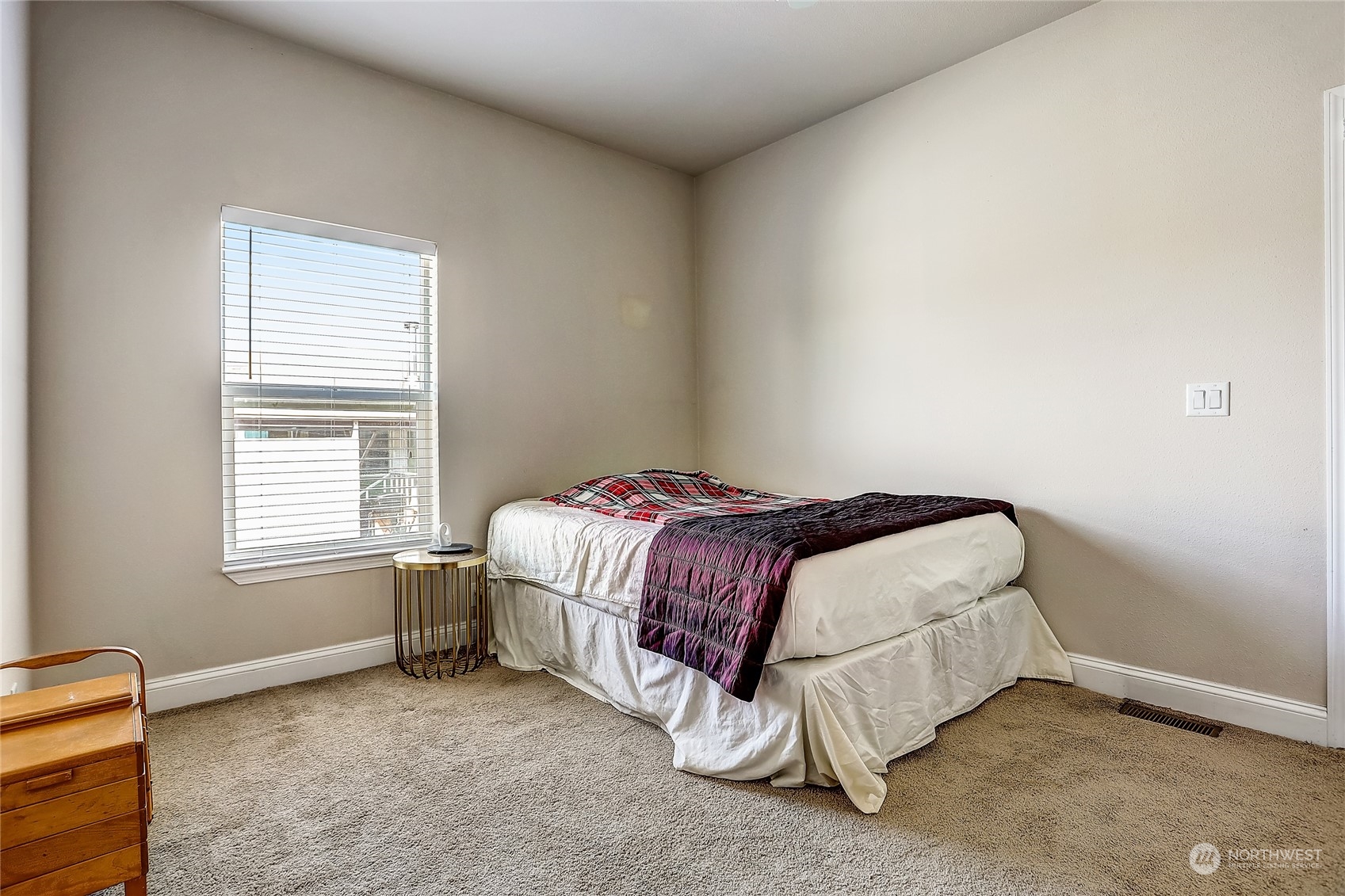 812 Pine Drive Enumclaw, WA 98022 - Photo 13 of 26 a bed sitting in a bedroom next to a window