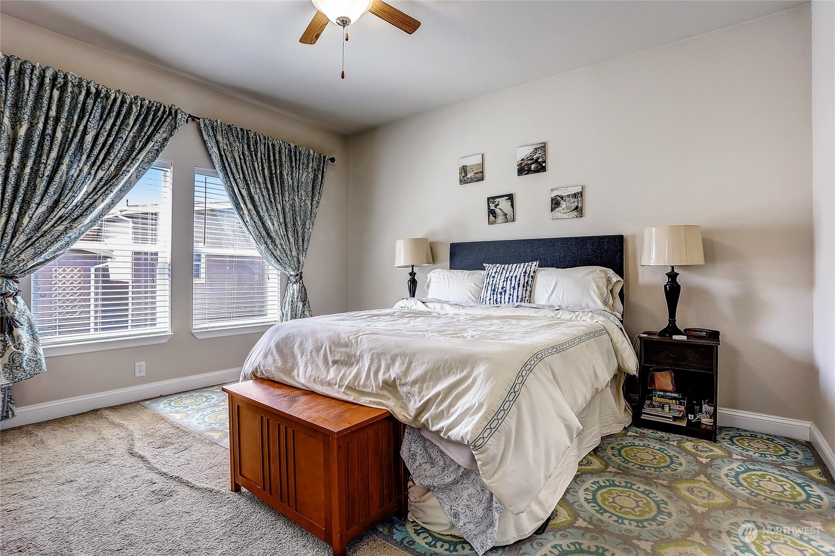 812 Pine Drive Enumclaw, WA 98022 - Photo 16 of 26 a bedroom with a bed and a large window
