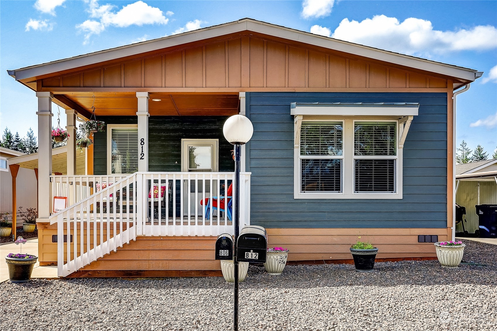 812 Pine Drive Enumclaw, WA 98022 - Photo 2 of 26 a front view of a house with entryway and stairs