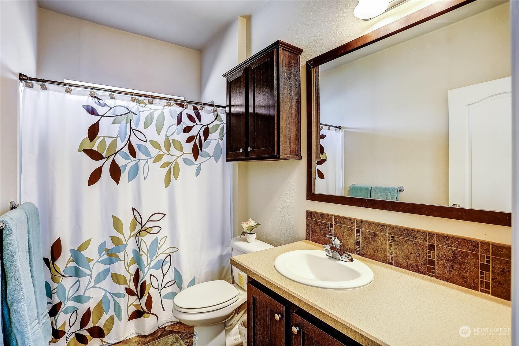 812 Pine Drive Enumclaw, WA 98022 - Photo 26 of 26 a bathroom with a sink toilet and shower