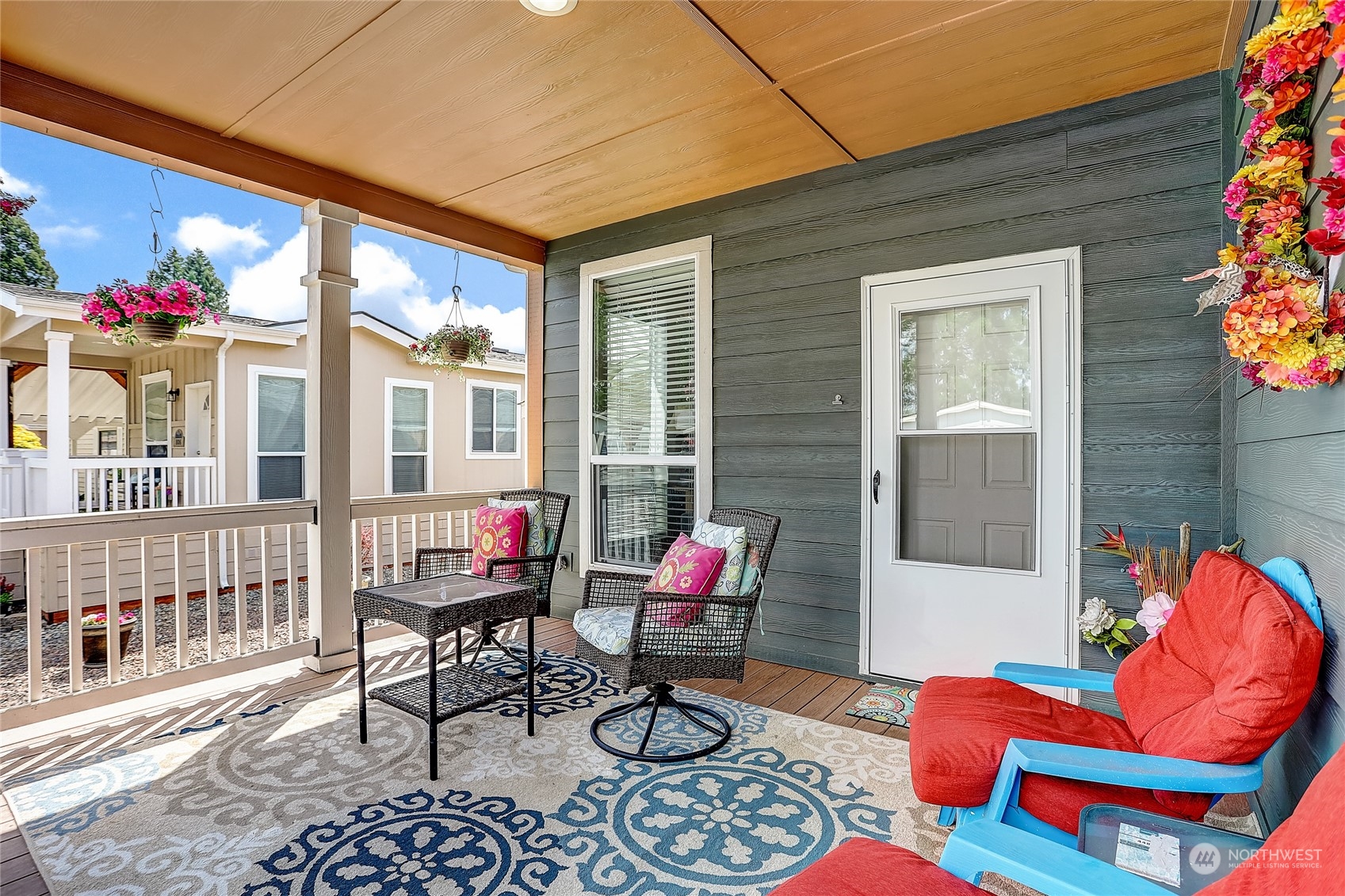 812 Pine Drive Enumclaw, WA 98022 - Photo 4 of 26 a backyard of a house with outdoor seating