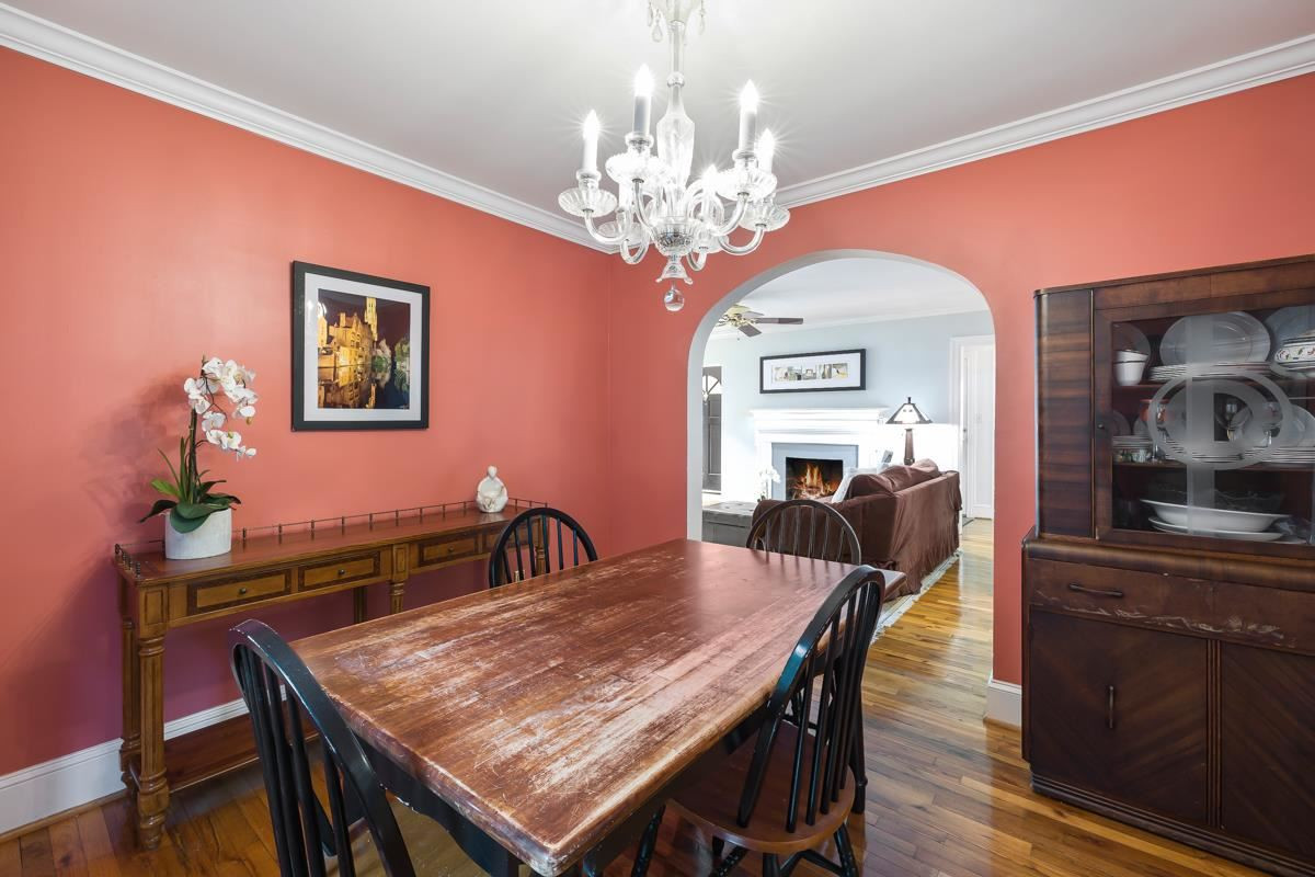 2506 Van Dyke Avenue Raleigh, NC 27607 - Photo 13 of 28 The dining room is ideally situated between the living room and breakfast/kitchen. Dining Room