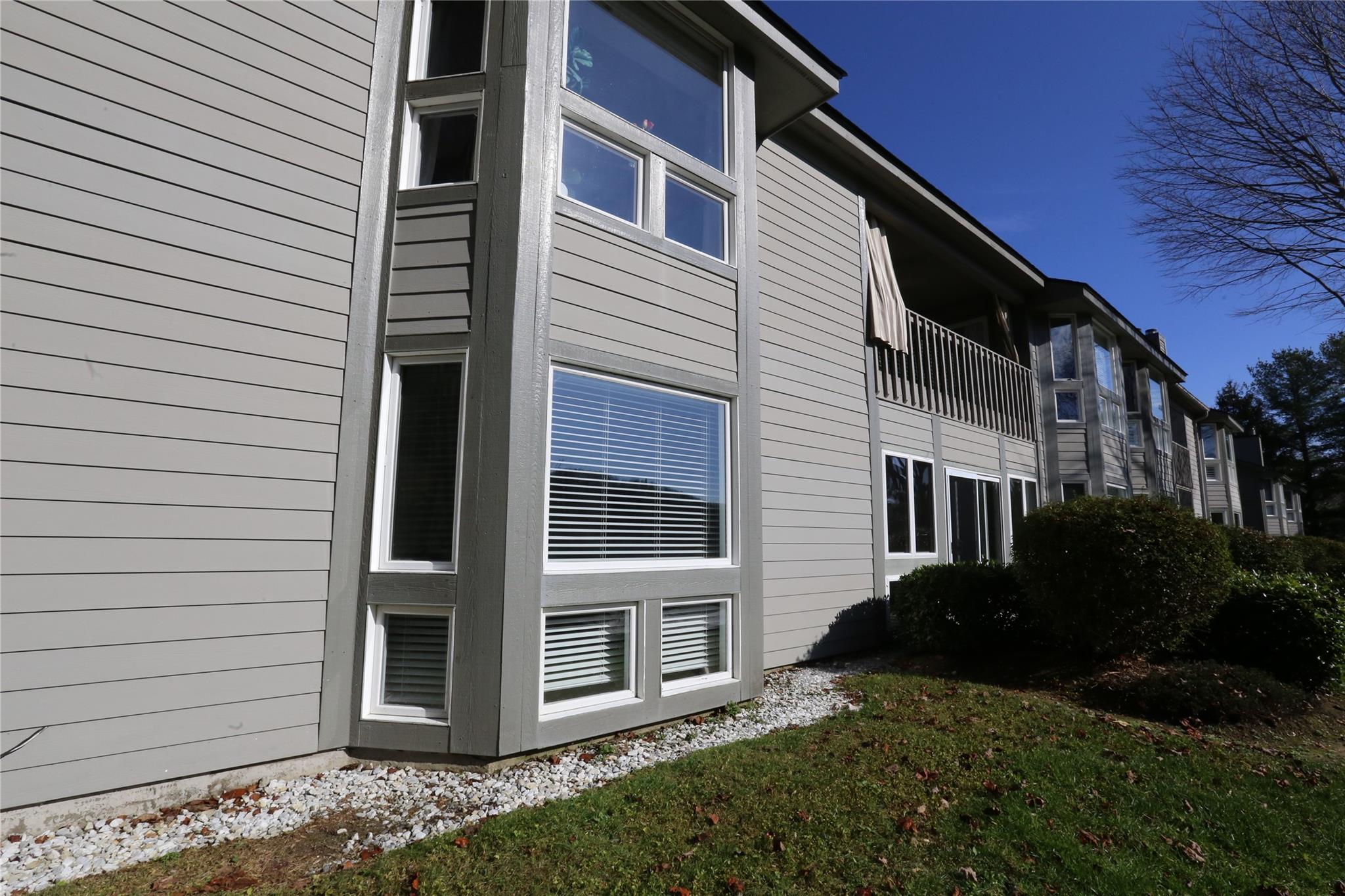 125 Burning Tree Lane Flat Rock, NC 28731 - Photo 2 of 15 a view of a house with a yard