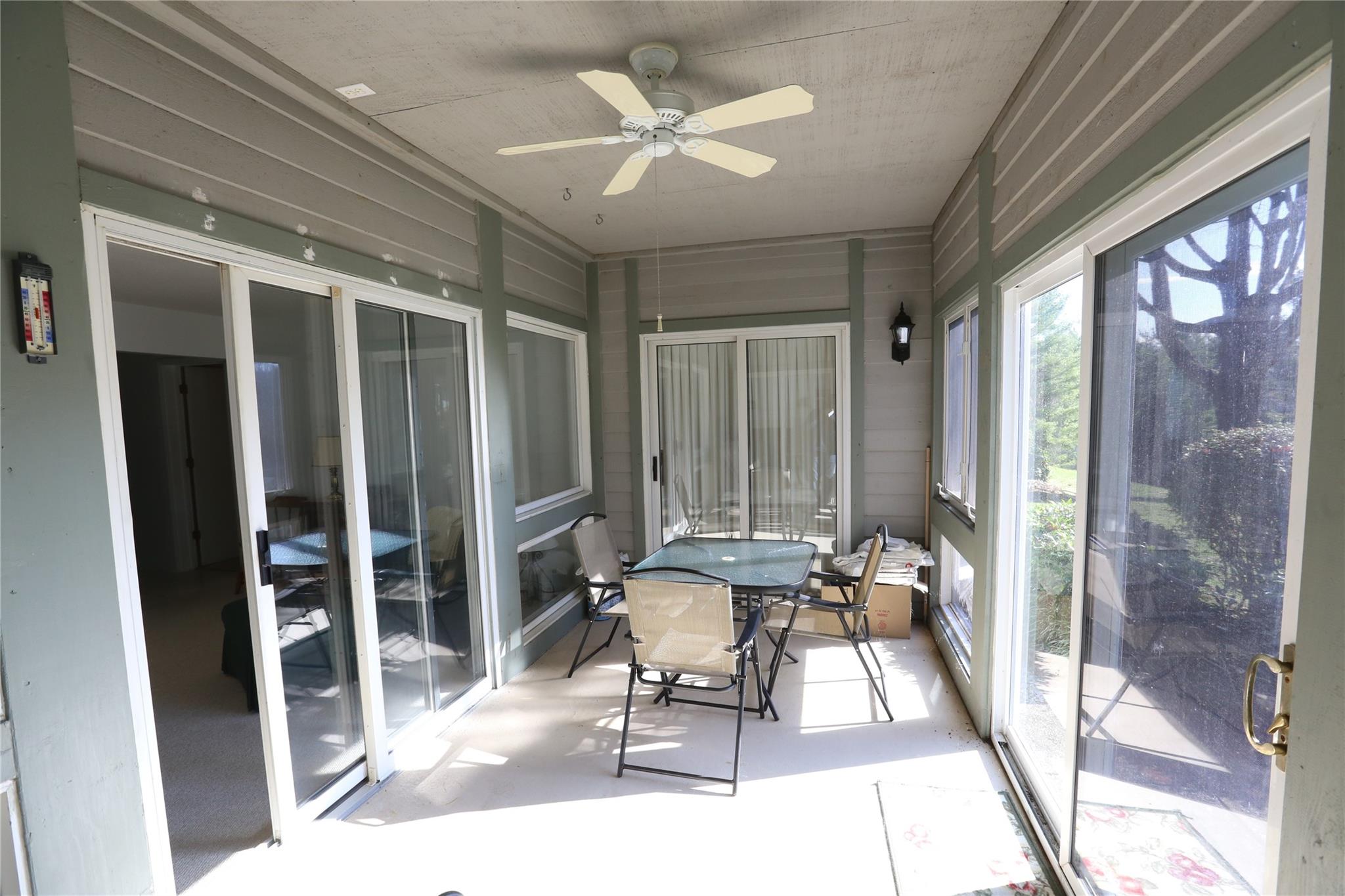 125 Burning Tree Lane Flat Rock, NC 28731 - Photo 5 of 15 a living room with furniture and a large window