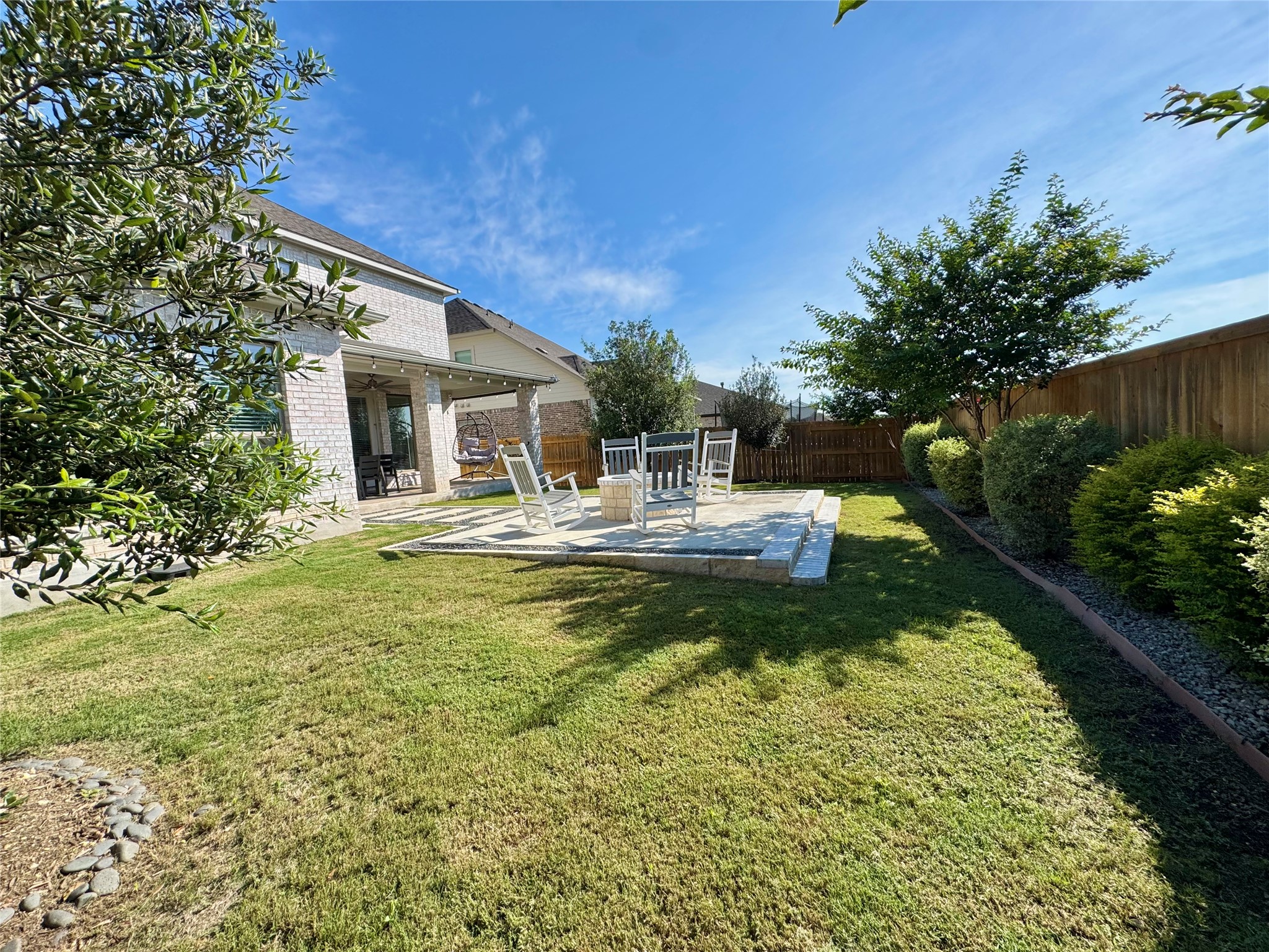 561 Cold Riv Run Kyle, TX 78640 - Photo 26 of 33 a view of a house with backyard and sitting area