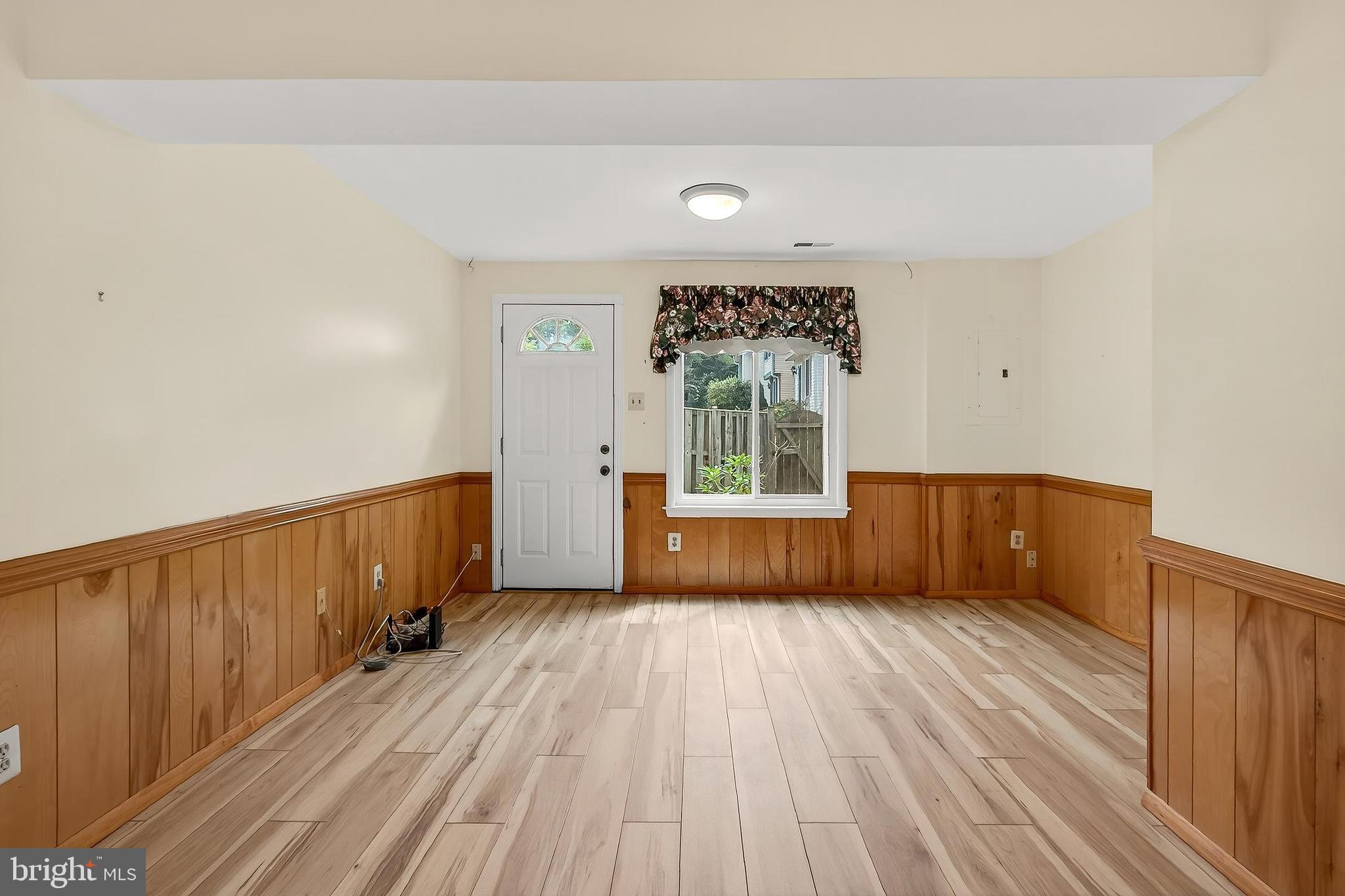 8353 Bark Tree Court Springfield, VA 22153 - Photo 23 of 32 Updated LVP Flooring in Rec Room