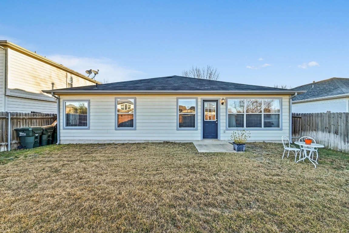 280 Spruce Drive Kyle, TX 78640 - Photo 24 of 30 Rear view of house with a fenced backyard and a patio