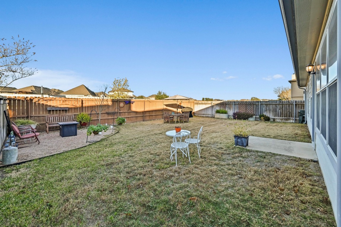 280 Spruce Drive Kyle, TX 78640 - Photo 26 of 30 Fenced backyard featuring a patio area