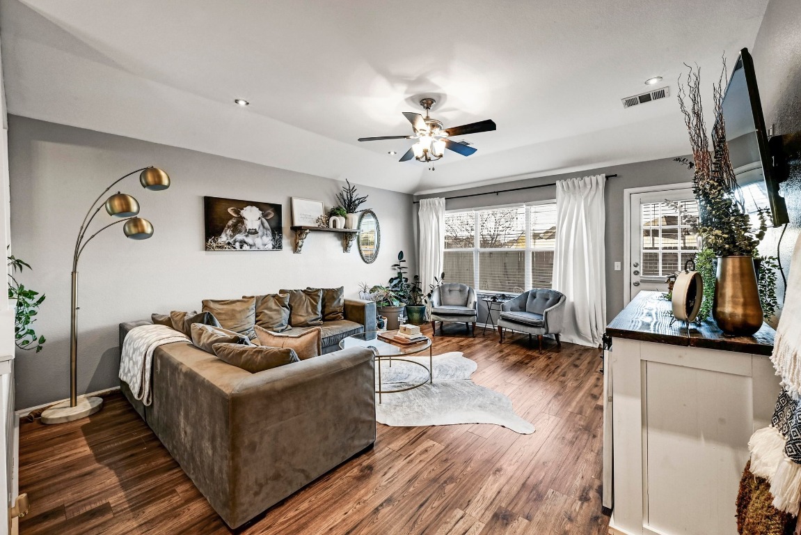 280 Spruce Drive Kyle, TX 78640 - Photo 5 of 30 Living area with ceiling fan and dark wood-style flooring