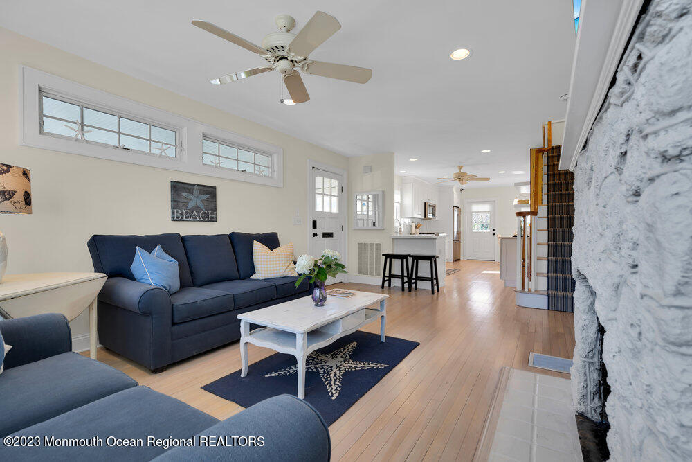 303 B Street Belmar, NJ 07719 - Photo 15 of 78 a living room with furniture and kitchen view