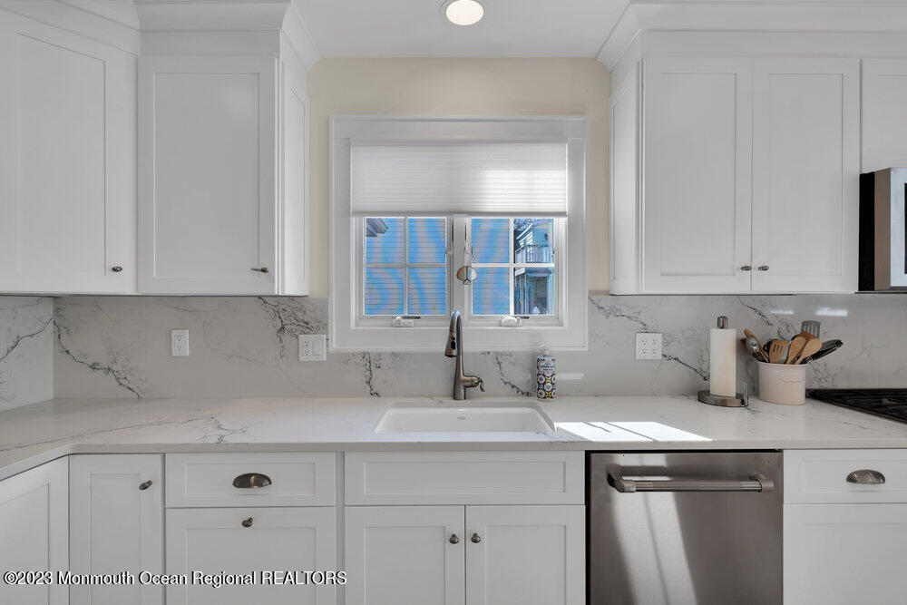 303 B Street Belmar, NJ 07719 - Photo 19 of 78 a kitchen with sink and cabinets
