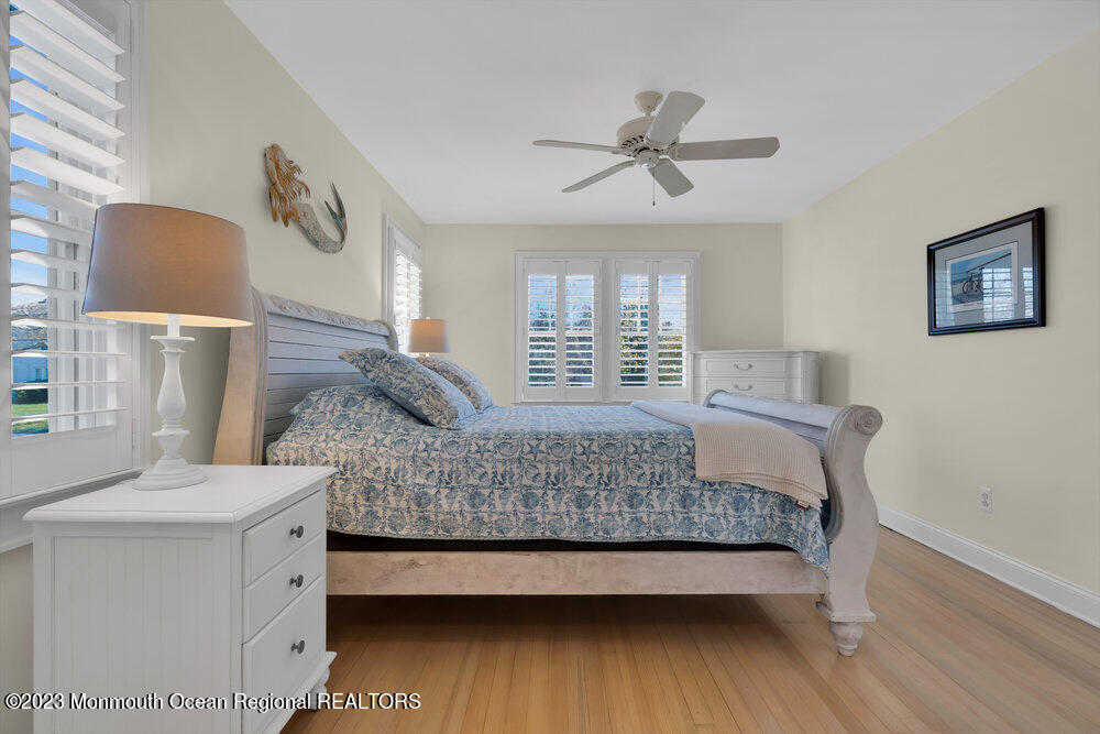 303 B Street Belmar, NJ 07719 - Photo 28 of 78 a living room with furniture and a wooden floor