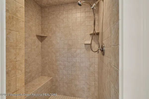 an aerial view of city and lake