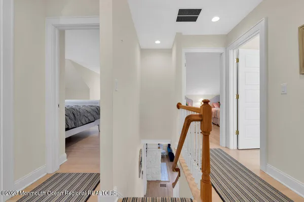 an aerial view of a house with a ocean view