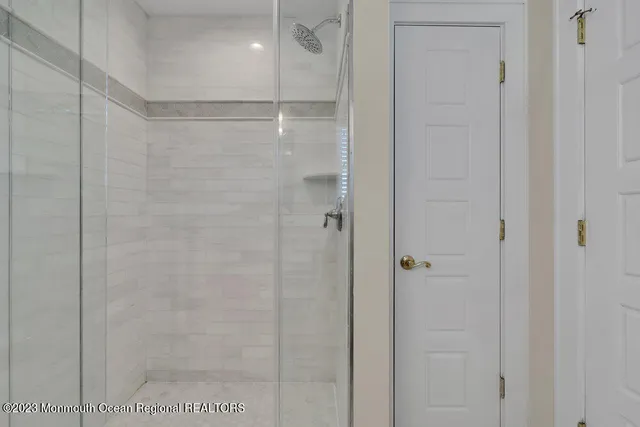 an aerial view of a house with a ocean view