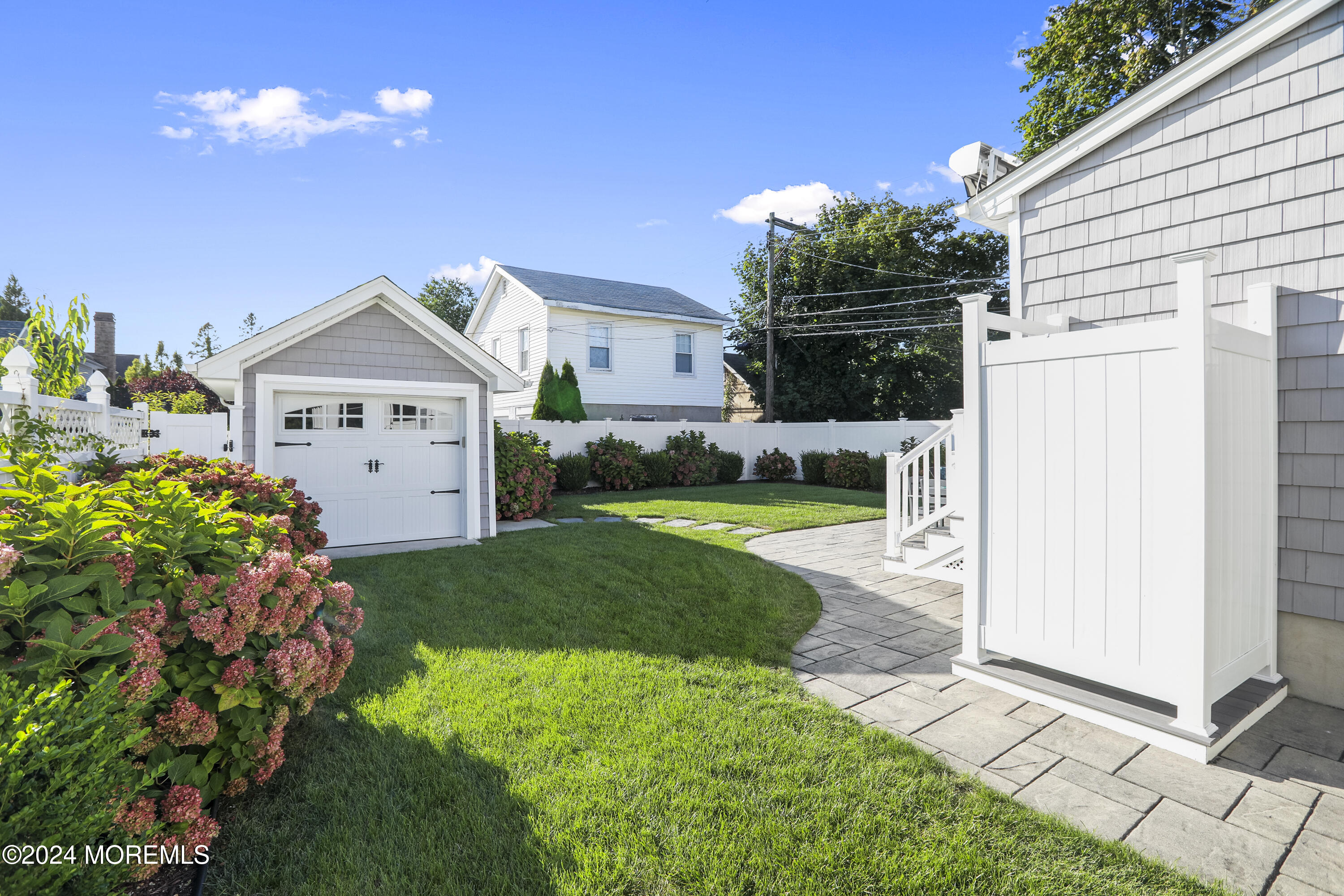 303 B Street Belmar, NJ 07719 - Photo 5 of 78 a front view of a house with a yard