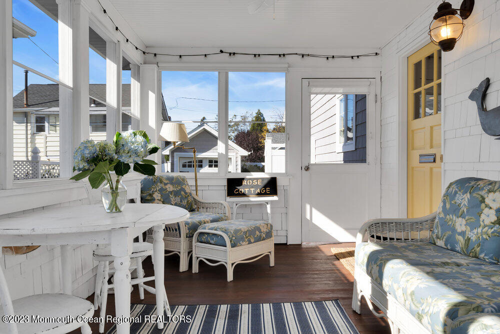 303 B Street Belmar, NJ 07719 - Photo 6 of 78 a living room with furniture and a table