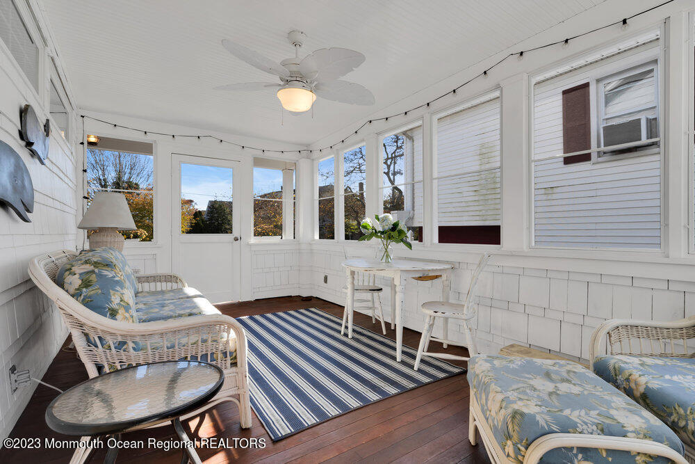 303 B Street Belmar, NJ 07719 - Photo 10 of 78 a living room with furniture and a wooden floor