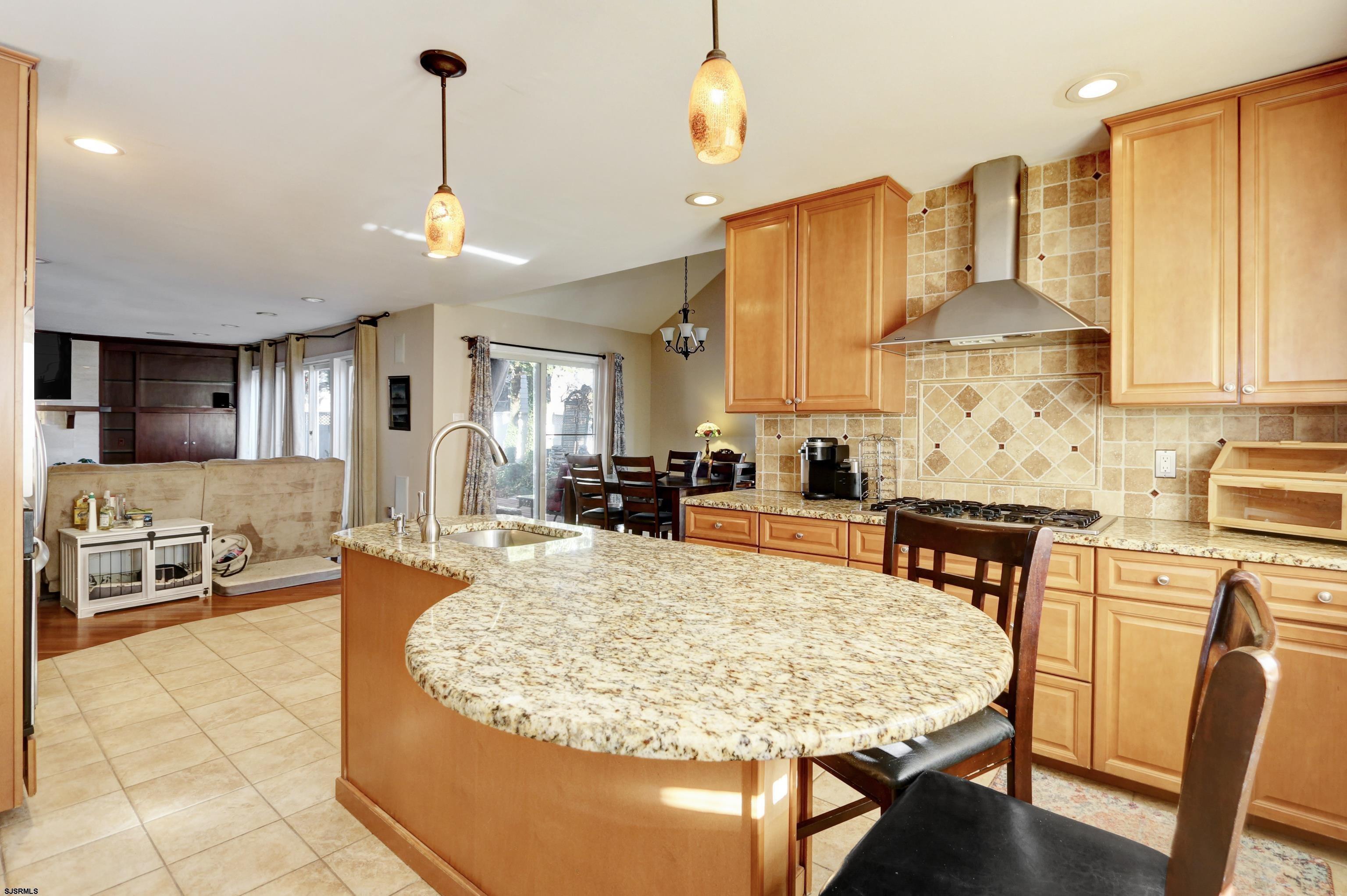 1860 Franklin Boulevard Linwood, NJ 08221 - Photo 12 of 39 a kitchen with stainless steel appliances granite countertop a sink and cabinets