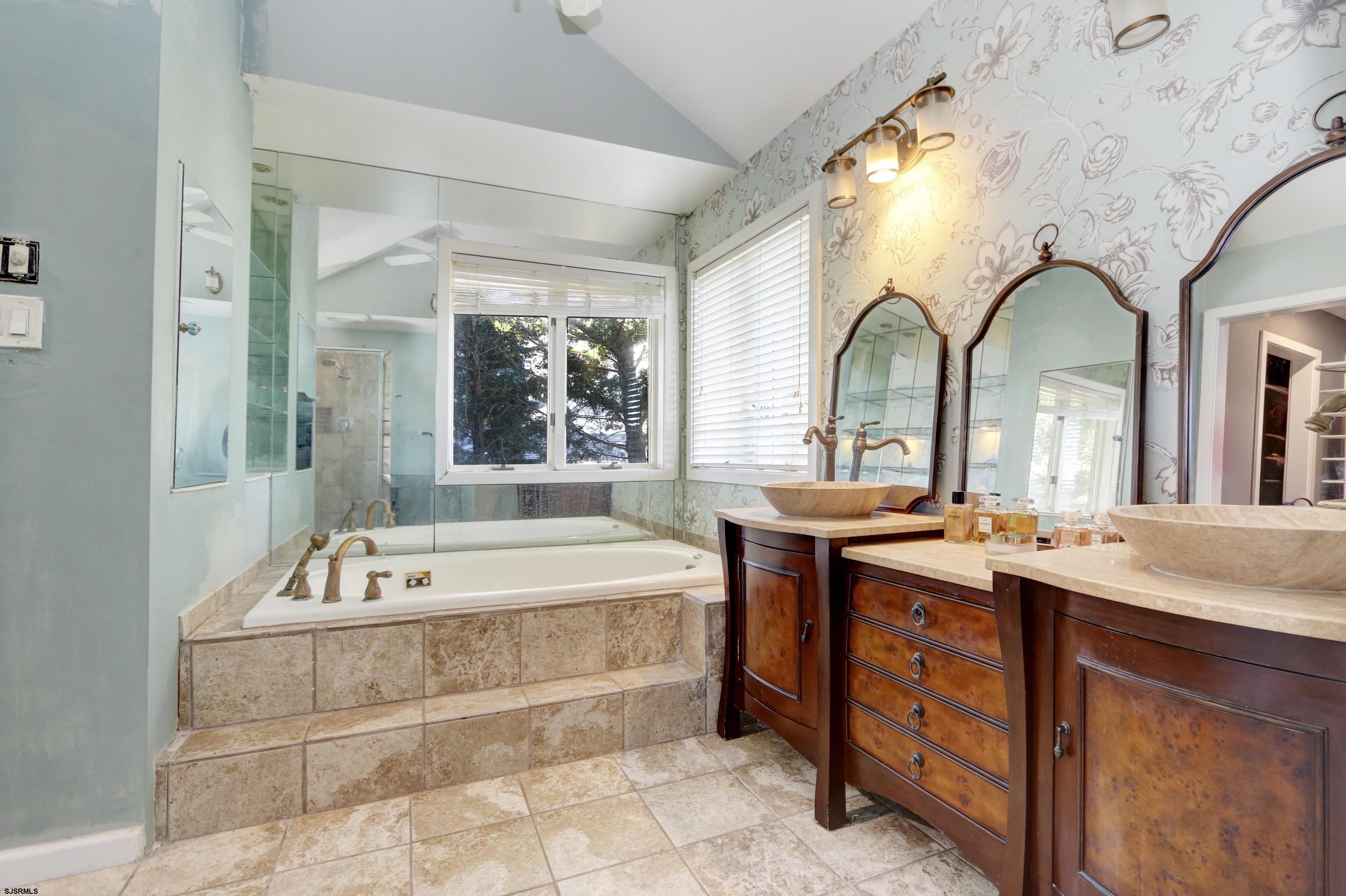 1860 Franklin Boulevard Linwood, NJ 08221 - Photo 18 of 39 a spacious bathroom with a tub sink and mirror