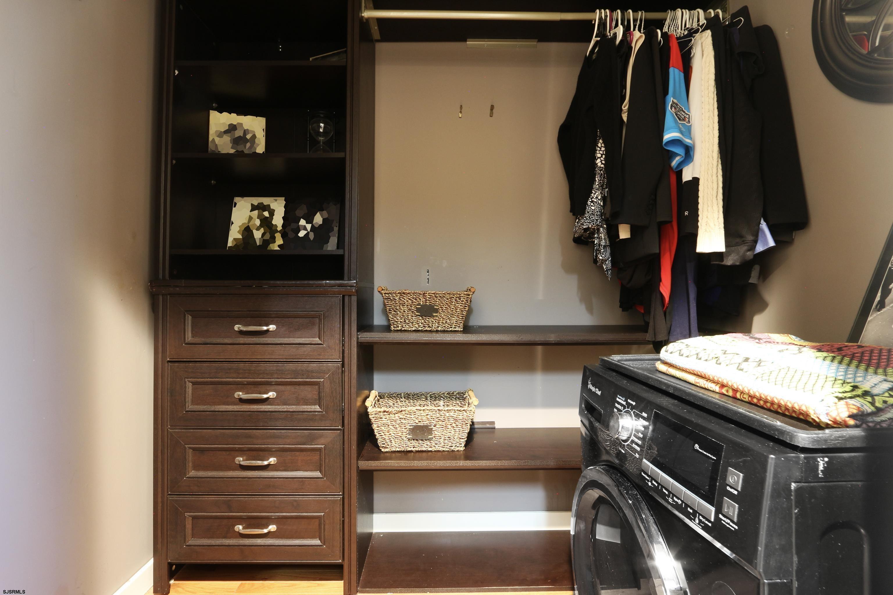 1860 Franklin Boulevard Linwood, NJ 08221 - Photo 19 of 39 a view of walk in closet with clothes and shoes