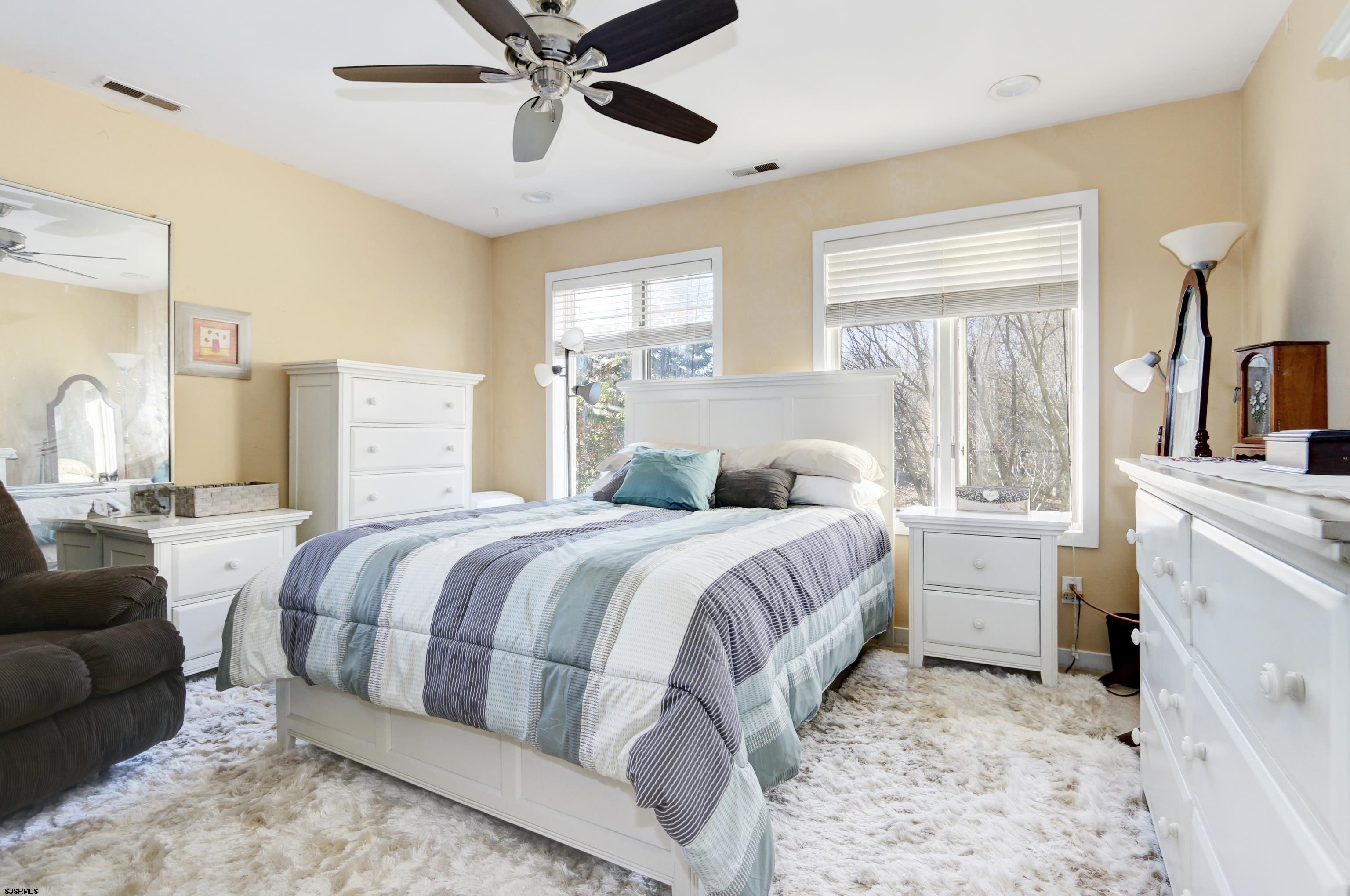 1860 Franklin Boulevard Linwood, NJ 08221 - Photo 22 of 39 a bedroom with a large bed and a window