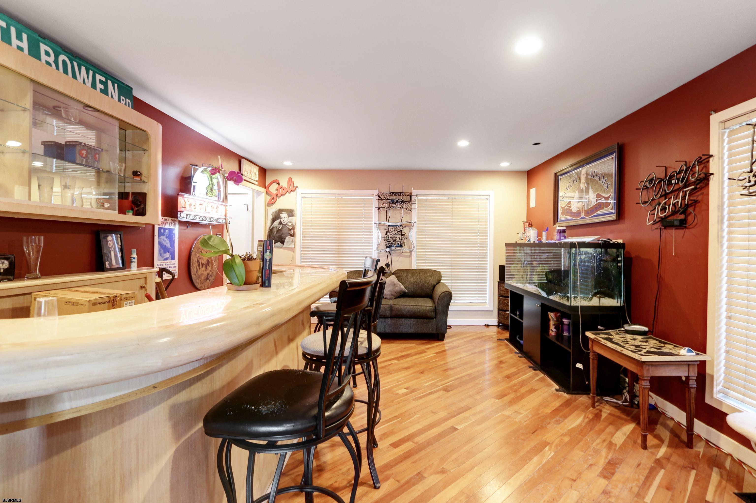 1860 Franklin Boulevard Linwood, NJ 08221 - Photo 26 of 39 a living room with furniture and a flat screen tv