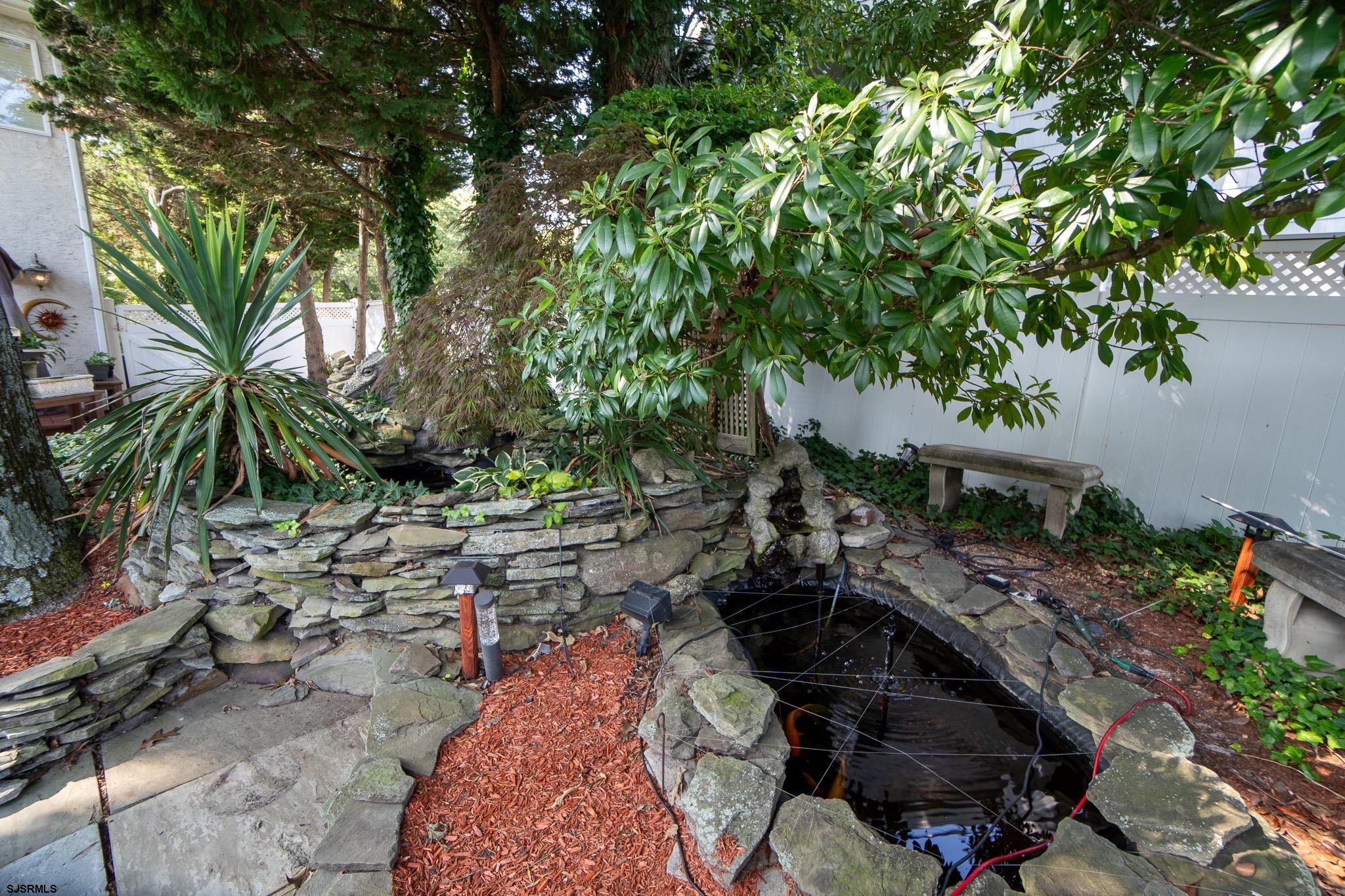 1860 Franklin Boulevard Linwood, NJ 08221 - Photo 28 of 39 a view of backyard with outdoor seating and trees