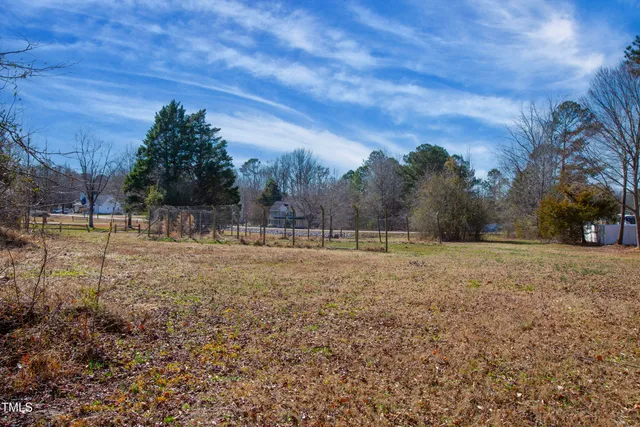 a view of a yard with an trees
