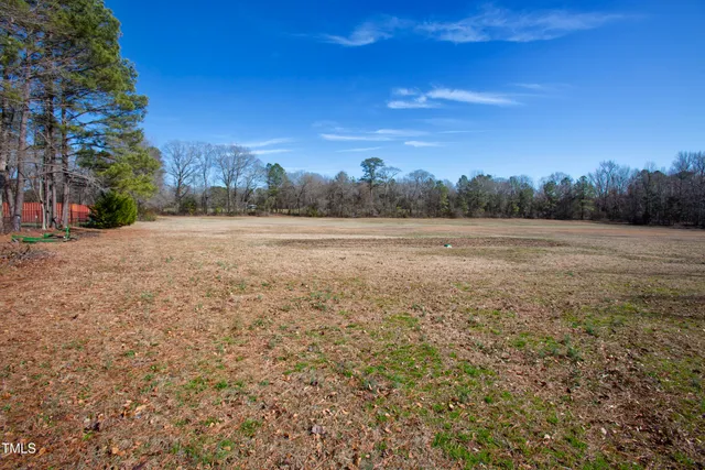 a view of an ocean beach and mountain