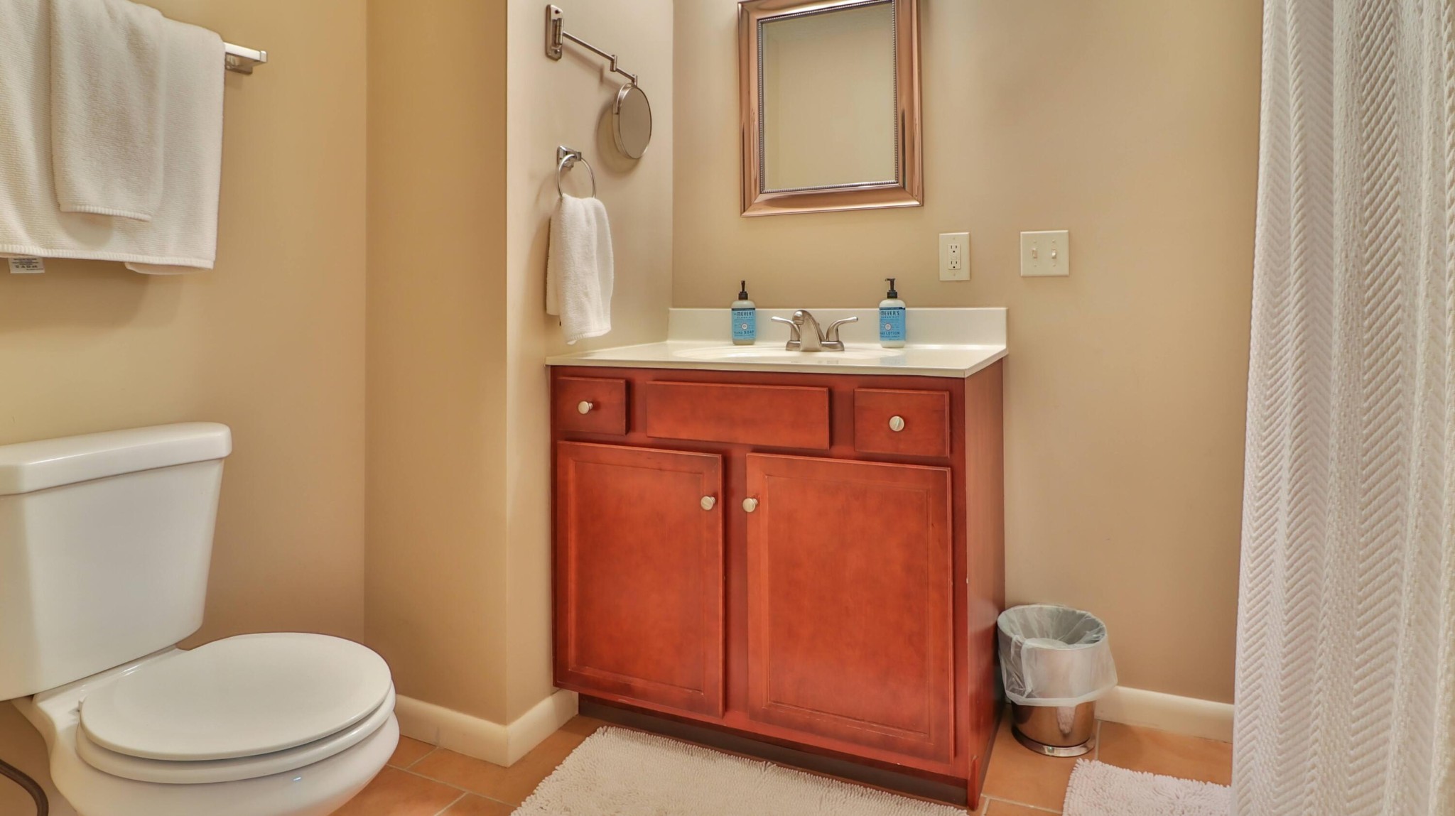 6108 Ricky Allen Road Corryton, TN 37721 - Photo 27 of 39 a bathroom with a sink a toilet and mirror