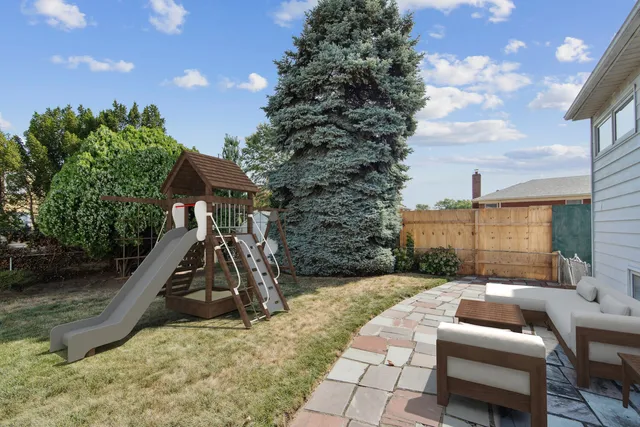 a view of a patio with a yard