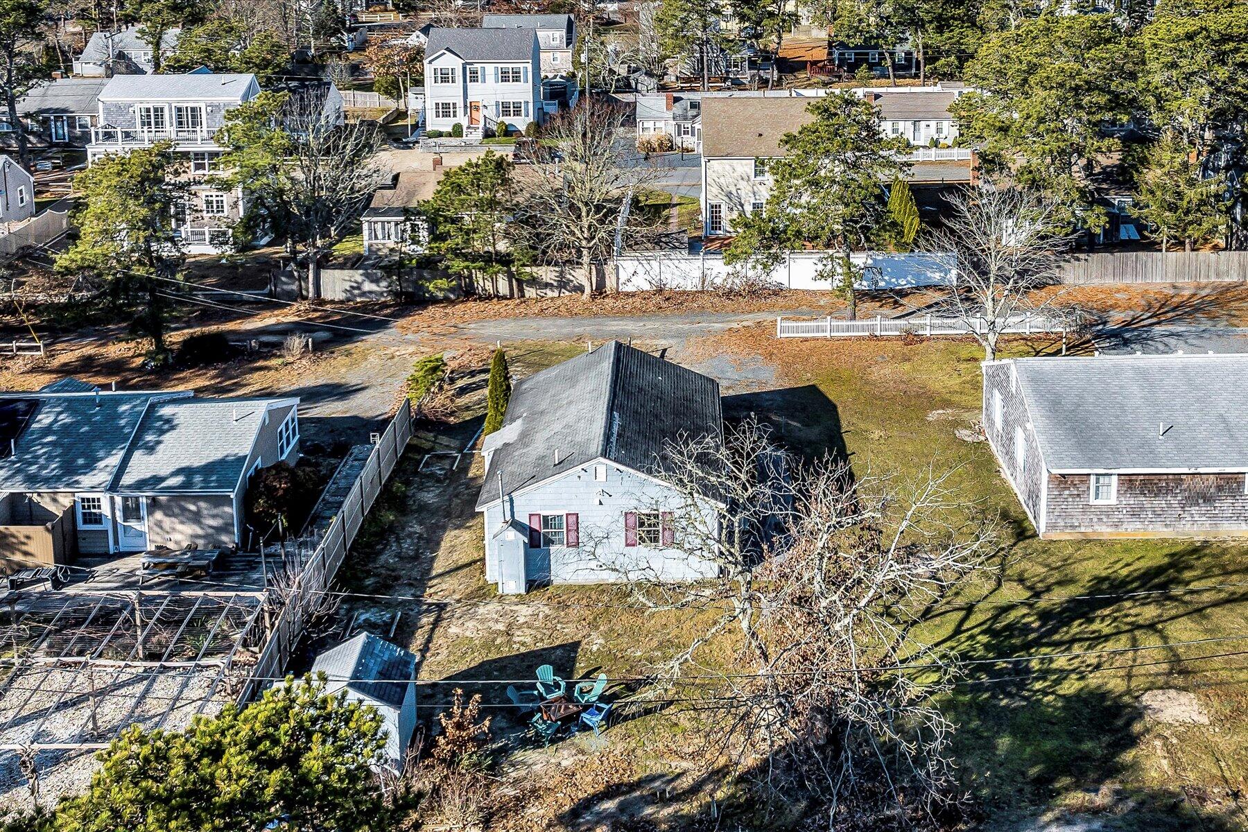 22 Edwards Road Dennis Port, MA 02639 - Photo 11 of 40 a view of residential houses with outdoor space