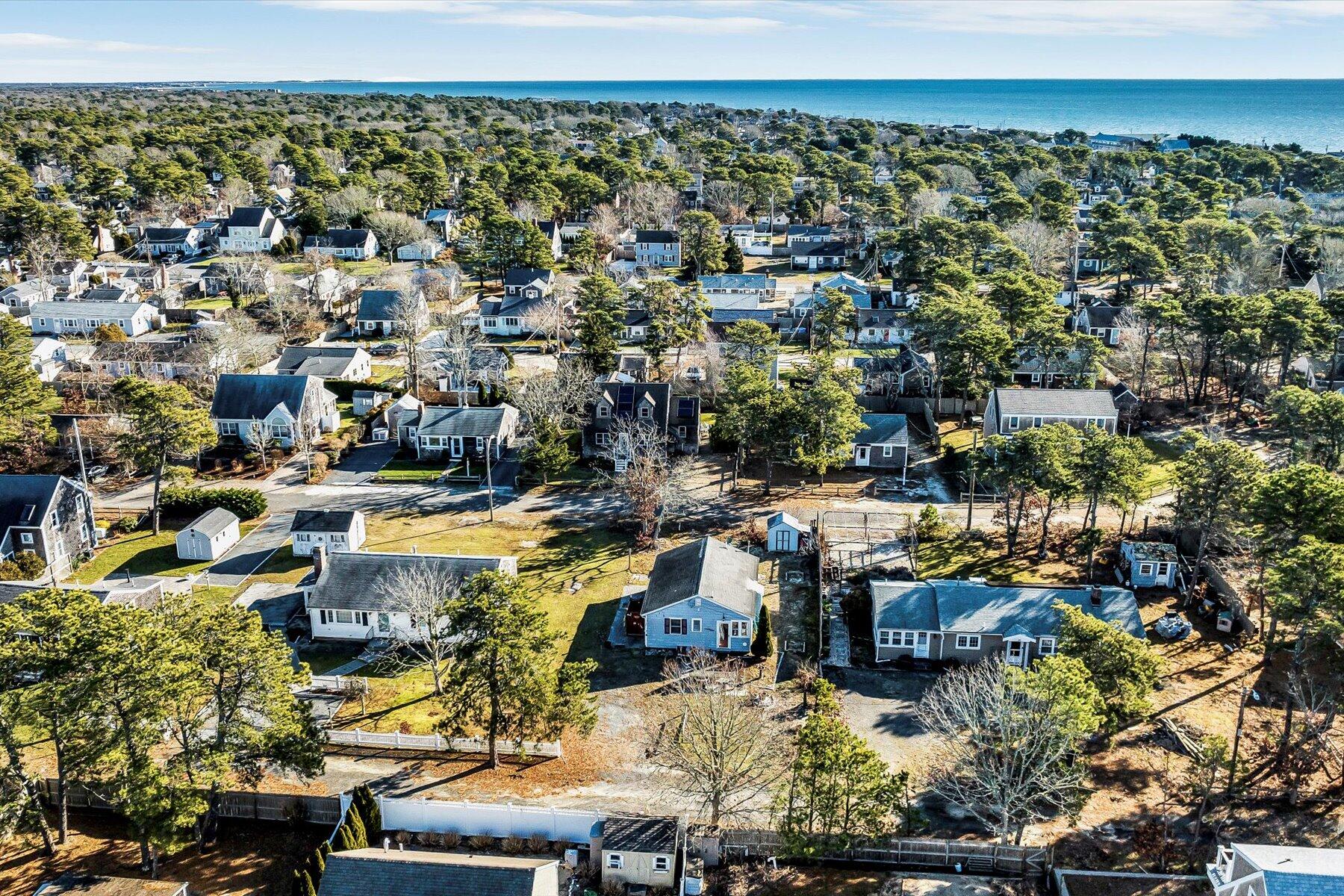 22 Edwards Road Dennis Port, MA 02639 - Photo 15 of 40 an aerial view of residential houses with outdoor space