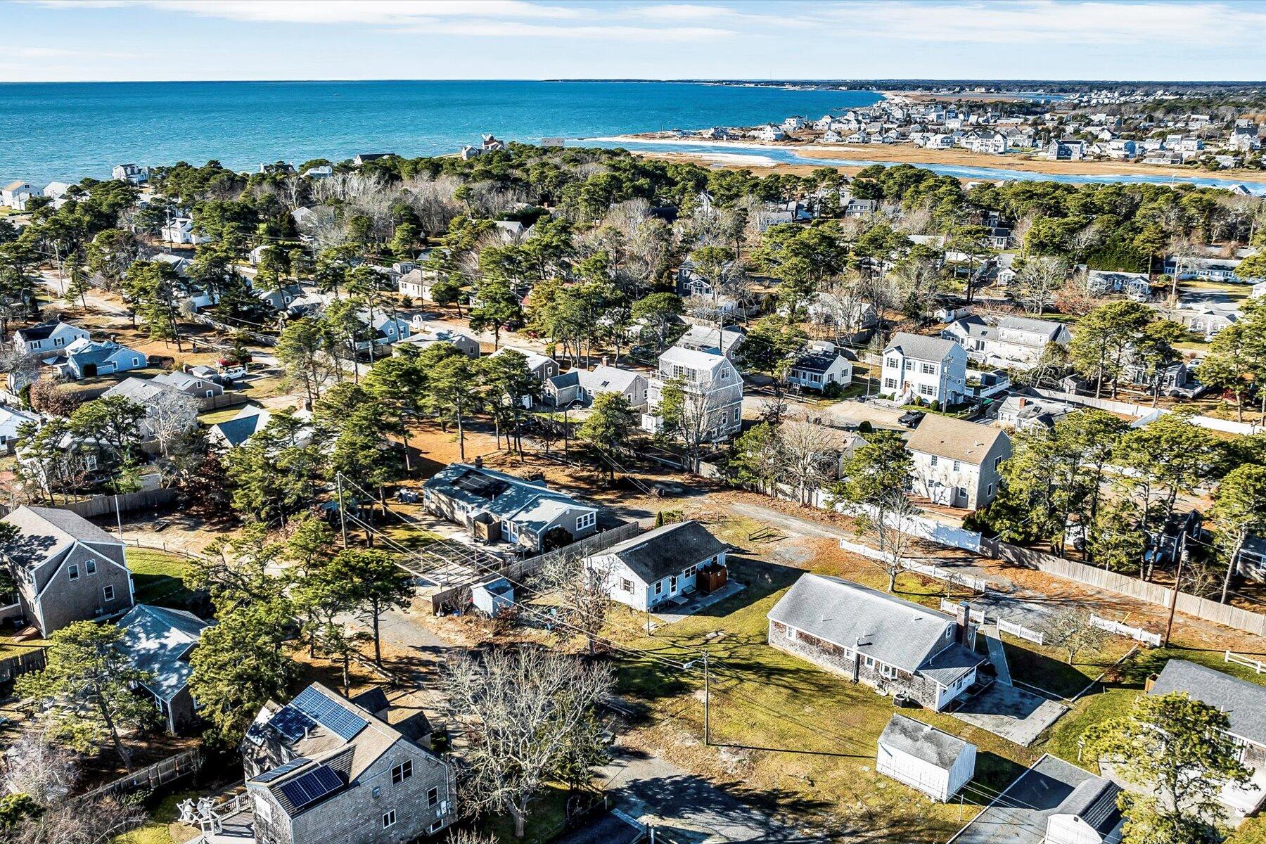 22 Edwards Road Dennis Port, MA 02639 - Photo 17 of 40 an aerial view of residential building with parking space