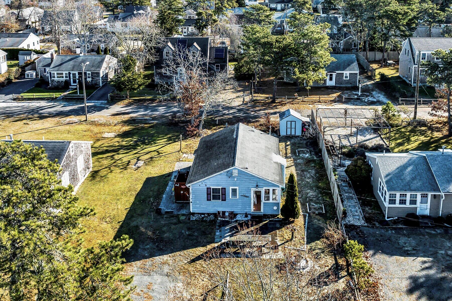 22 Edwards Road Dennis Port, MA 02639 - Photo 18 of 40 a aerial view of a house with a yard