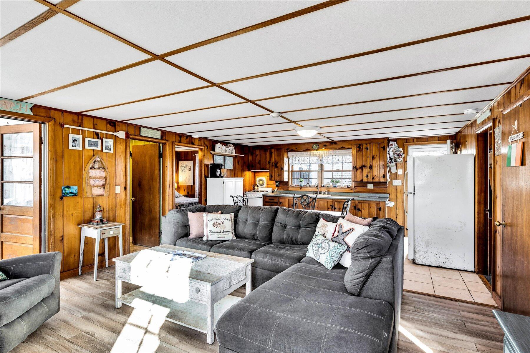 22 Edwards Road Dennis Port, MA 02639 - Photo 23 of 40 a living room with furniture and a large window
