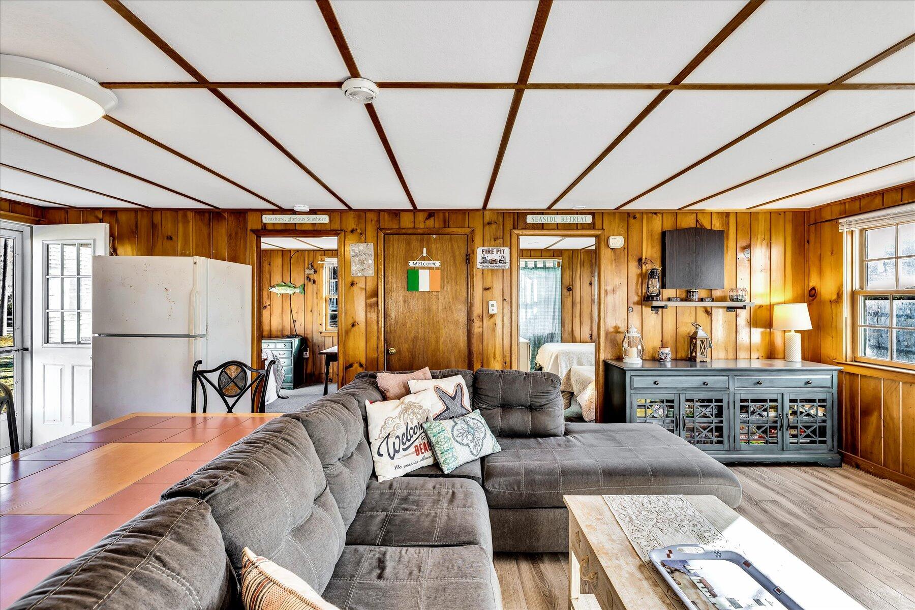 22 Edwards Road Dennis Port, MA 02639 - Photo 26 of 40 a living room with furniture and a large window